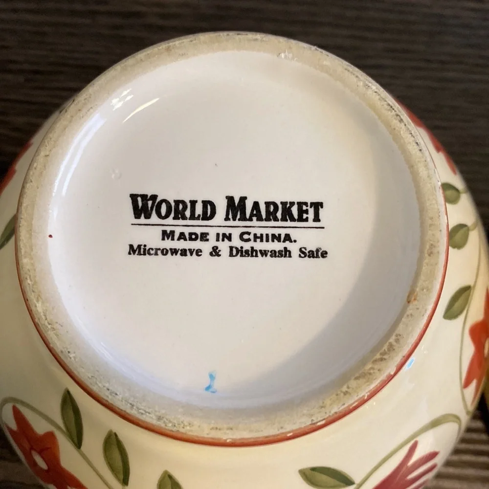 World Market (2) pair of small bowls. Cream with leaves and flowers. Cute!